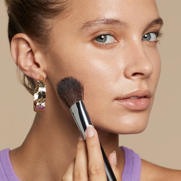 Model with Complexion Brush